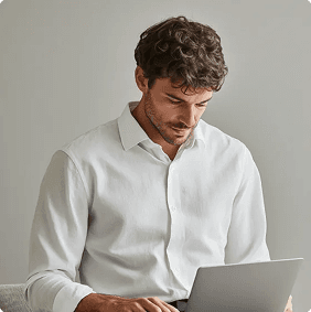 Expert working on laptop